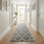 Black trellis runner rug in a bright hallway