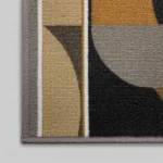 Close-up of grey and white trellis rug pattern