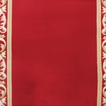 Curlicue floral border on red background