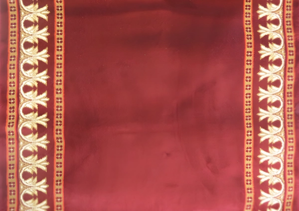 Golden acanthus border on maroon