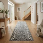 Grey geometric runner in a bright, modern hallway