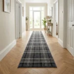 Grey tartan runner rug in a bright, modern hallway
