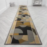 Grey trellis runner rug in a bright hallway
